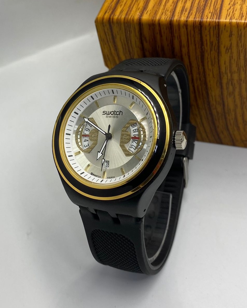 Montre Swatch Irony Swiss – Élégance noire & détails dorés